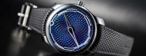 Ming 29.06 Peep Show Turns Timekeeping Into a Polarized Dial Performance Ming 29.06 Peep Show titanium watch with color-shifting guilloché dial