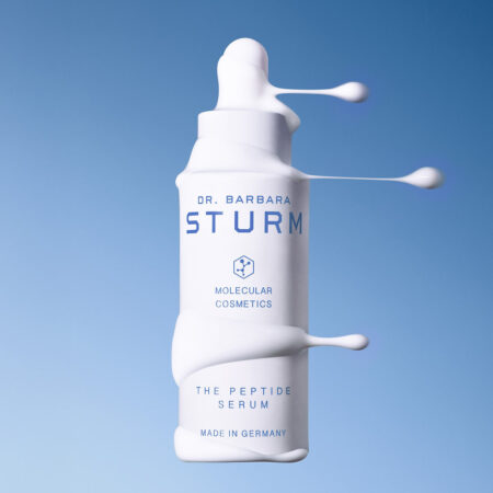 Dr. Barbara Sturm’s Travel Skincare Edit Is Built for Skin in Motion Dr. Barbara Sturm travel skincare essentials arranged with cleanser, creams and serums for a refined travel routine