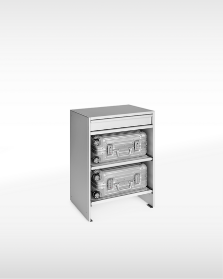 RIMOWA and Lehni Turn Cabin Suitcase Storage Into Aluminium Furniture RIMOWA Lehni aluminium suitcase storage bench and drawer in silver and black