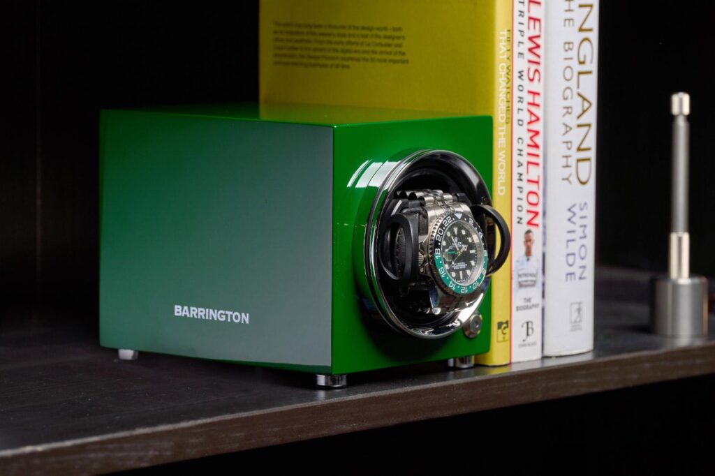 Selection of watch straps and watch winders arranged on a modern collector’s desk