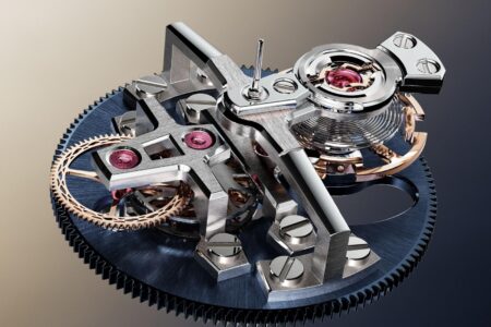 Constant Force in Watchmaking Explained Close-up of a high-end mechanical watch movement showing gears, spring barrel and escapement components