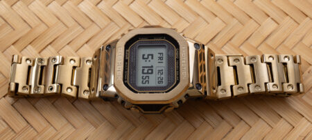 Casio G-Shock GMW-BZ5000 gold-tone full-metal digital watch on wrist
