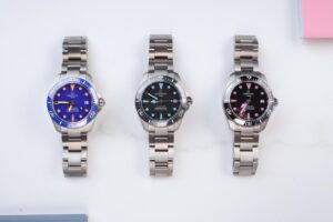 Certina DS Action Diver 38mm Titanium watches with black pink, grey turquoise and blue orange dial accents