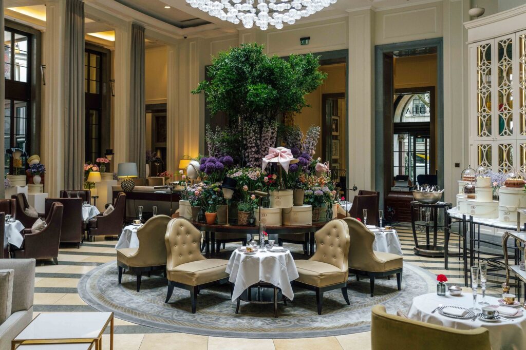 Millinery display inside Corinthia London Crystal Moon Lounge celebrating the British summer season