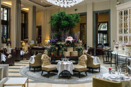 Millinery display inside Corinthia London Crystal Moon Lounge celebrating the British summer season