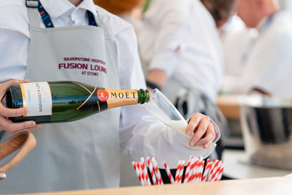Silverstone Adds Moët Hennessy to Its British Grand Prix Hospitality Lineup Moët and Chandon champagne hospitality setting at Silverstone during Formula 1 weekend