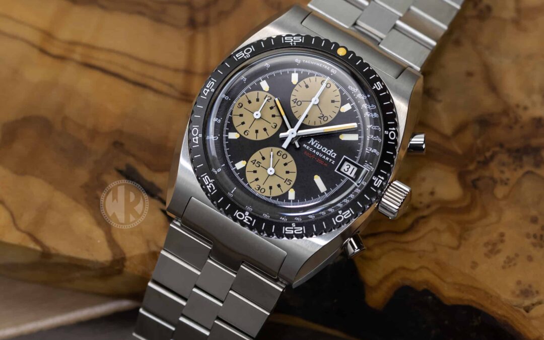 Nivada Grenchen Autochron MecaQuartz with black dial, tan subdials and stainless steel bracelet