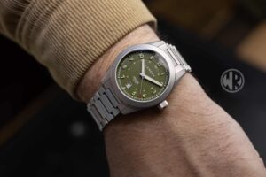 Canopy Field One Review: A Lightweight Titanium Field Watch With Modern Details Canopy Field One titanium field watch with green dial and bracelet