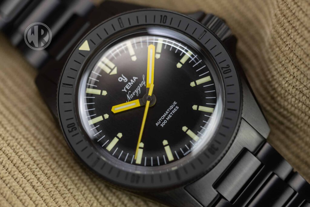 Yema Navygraf Phantom black dive watch with yellow hands on black bracelet