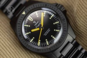 Yema Navygraf Phantom black dive watch with yellow hands on black bracelet