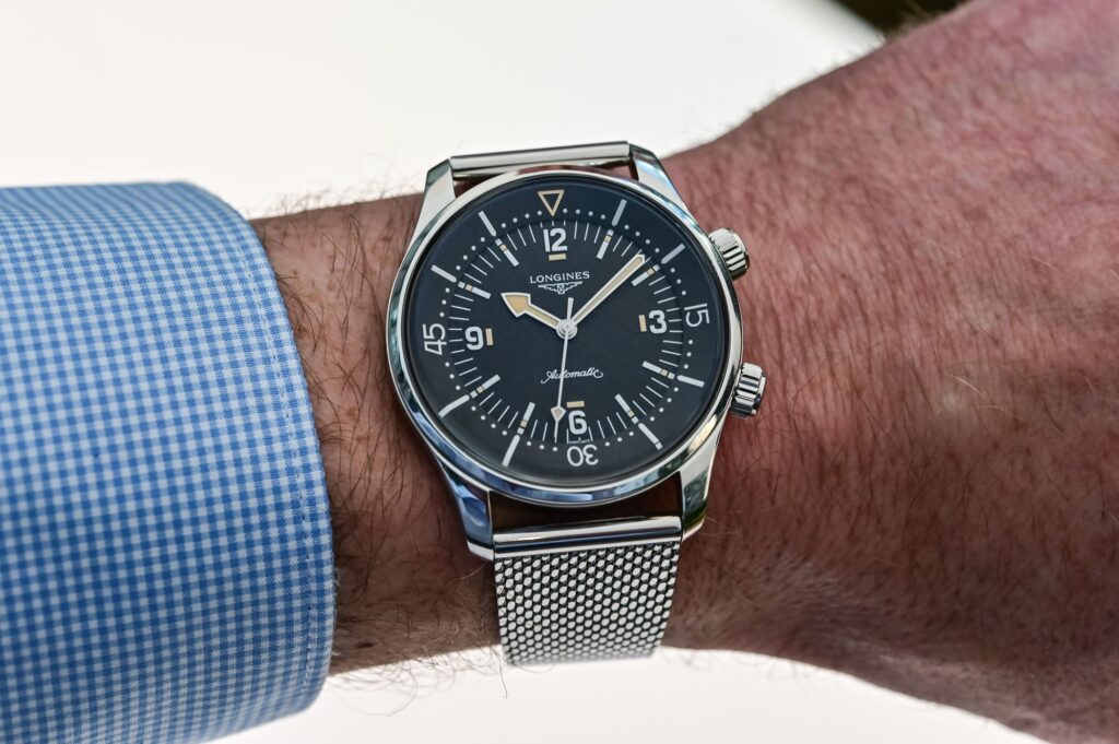 Longines Legend Diver 59 Brings Back the 42mm No-Date Icon Longines Legend Diver 59 with black grained dial and Milanese mesh bracelet