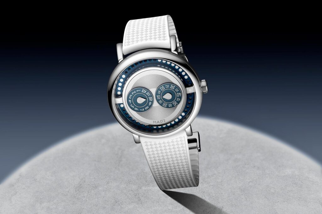 MB&F M.A.D.2 LIVE watch with silver dial and blue hour and minute discs