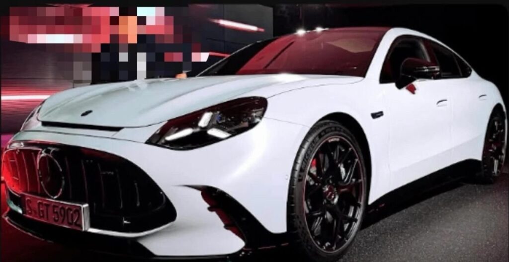 Mercedes-AMG GT 4-Door Coupe EV Shows Its Face Before Debut Mercedes-AMG GT 4-Door Coupe EV front end with vertical-slat grille and sporty bumper
