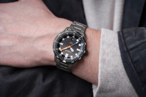 Nodus Gives the Sector Deep a Damascus Bezel and a Longer Running Movement Nodus Sector Deep Damascus dive watch with gunmetal DLC case and black Damascus bezel