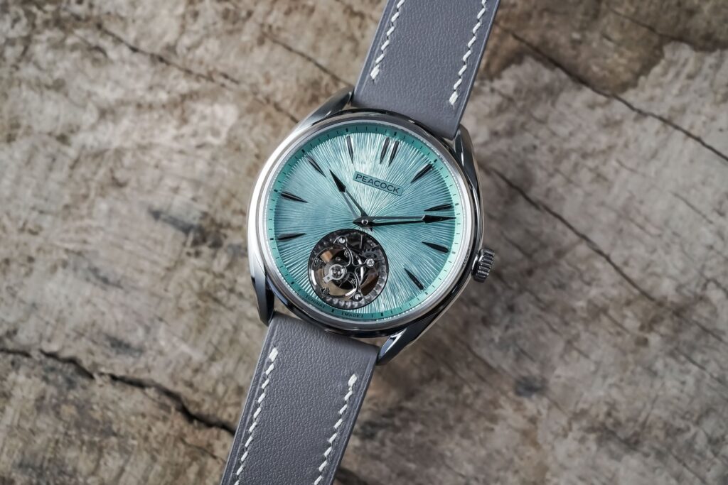 Peacock’s Divine Ultra-Thin Tourbillon Makes a Serious Case for Modern Chinese Watchmaking Peacock Divine Ultra-Thin Tourbillon with micro-chased green dial and visible flying tourbillon