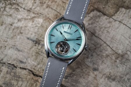 Peacock’s Divine Ultra-Thin Tourbillon Makes a Serious Case for Modern Chinese Watchmaking Peacock Divine Ultra-Thin Tourbillon with micro-chased green dial and visible flying tourbillon