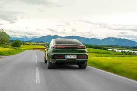 Porsche Cayenne S Coupé Electric Finds the Performance SUV Sweet Spot Porsche Cayenne S Coupé Electric driving on a mountain road