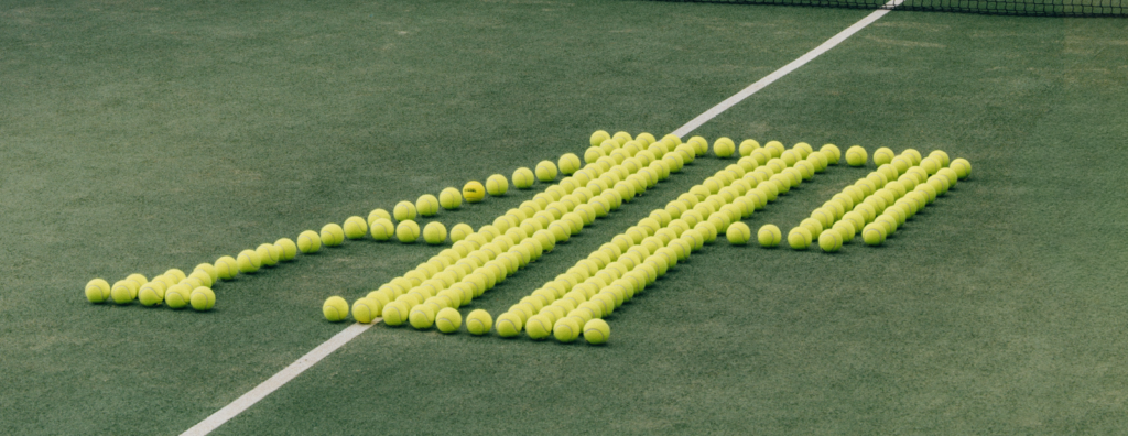Audemars Piguet Brings Haute Horlogerie Onto the Padel Court A luxury padel court with a visible tournament clock and players in action