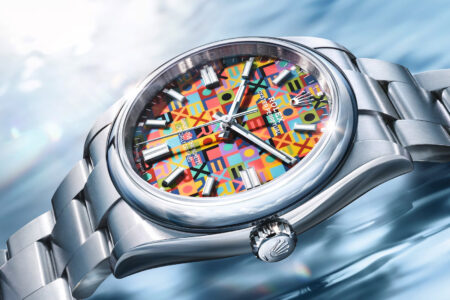 Rolex Oyster Perpetual with colourful Jubilee dial beside a Jubilee bracelet Datejust