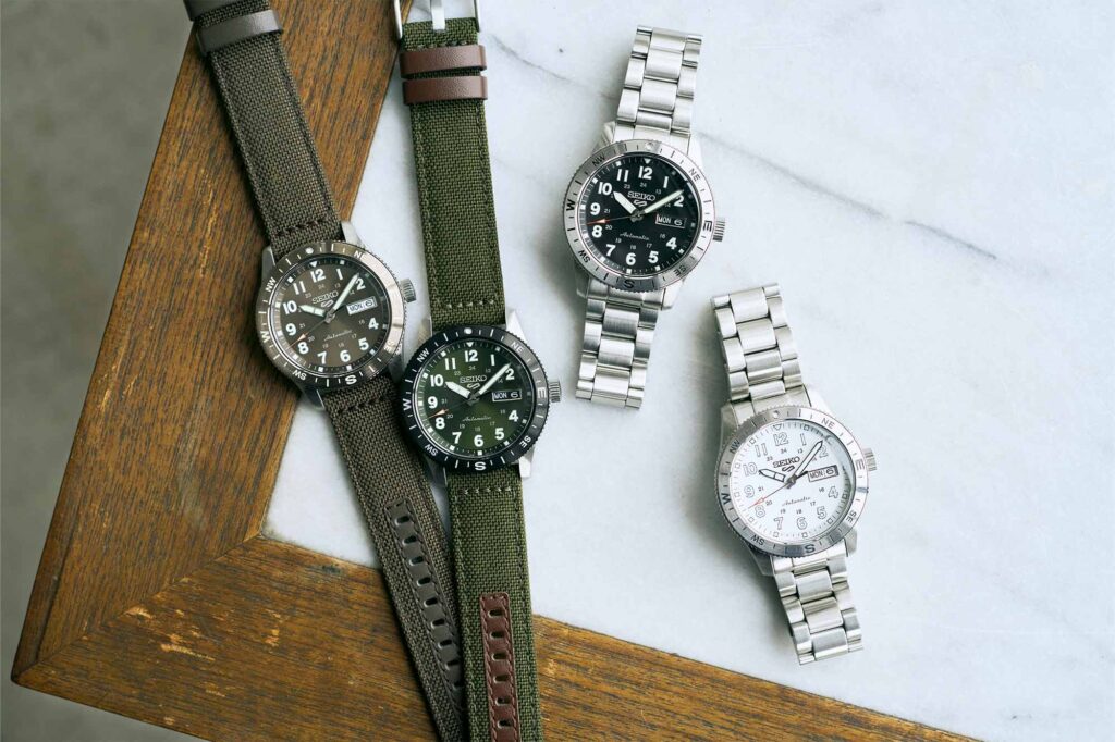 Seiko 5 Sports Field compass bezel watches in black, white, green and brown dial versions