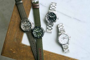 Seiko 5 Sports Field compass bezel watches in black, white, green and brown dial versions