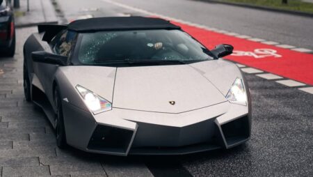 Lamborghini Reventón Roadster driving on wet streets in Hamburg