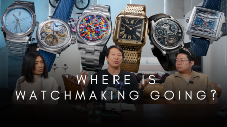 Visitors at Watches and Wonders 2026 viewing new luxury watches in a modern exhibition setting