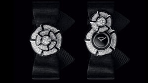 Chanel Nœud de Camélia diamond secret watch with camellia flower cover on black strap