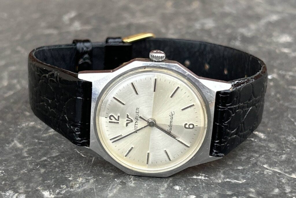 Vintage Seiko Turtle, Longines Comet and Grand Seiko watches arranged together