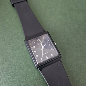 Casio MQ-27-1B black rectangular analog watch on a black strap