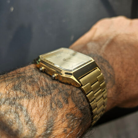 Casio AQ-230EGG-3AEF gold-tone ana-digi watch on wrist
