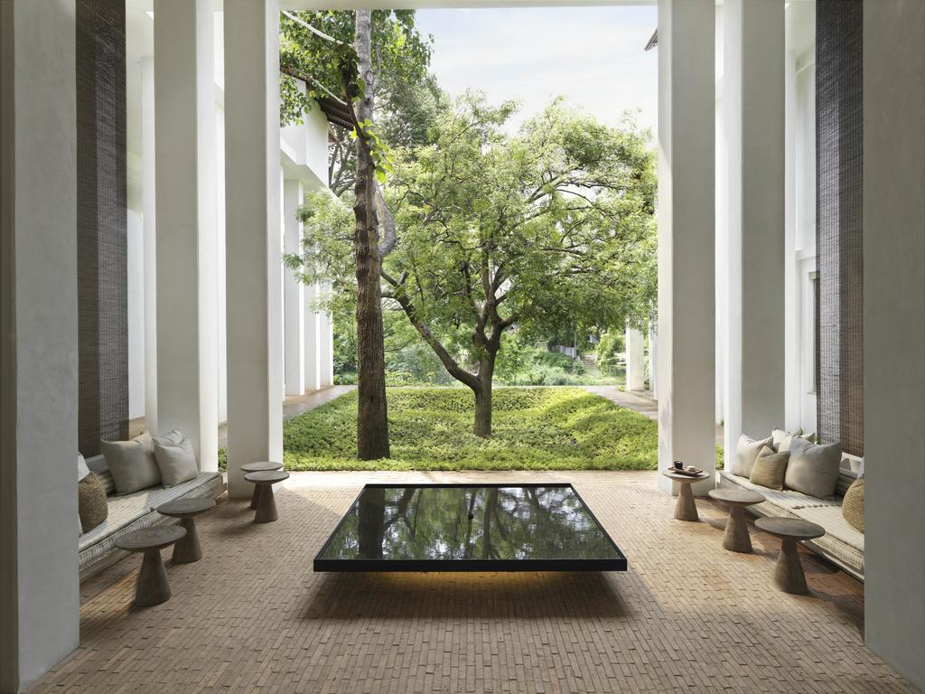 Raya Heritage Chiang Mai Is Quiet Luxury on the Ping River Raya Heritage Chiang Mai riverside suite with neutral interiors and garden views