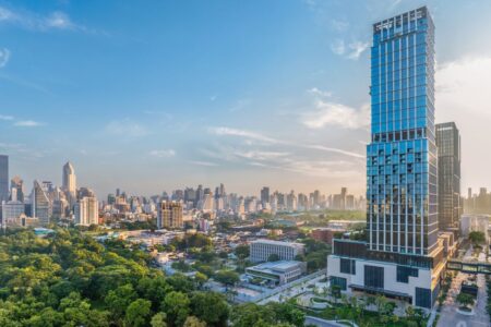 Guestroom view at The Ritz-Carlton Bangkok overlooking the city skyline