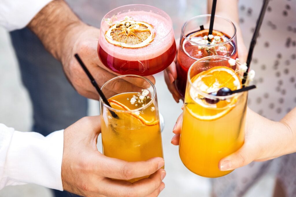 Premium At-Home Cocktails Are Redefining Luxury Entertaining Elegant home bar with premium spirits, crystal glassware and a freshly made cocktail