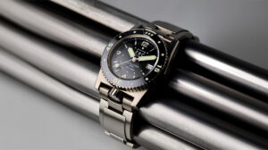 ZRC Grands Fonds MN64 Titanium dive watch with black ceramic bezel and dark sunburst dial