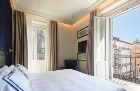 Only YOU Boutique Hotel Madrid brings palace style to Chueca Only YOU Boutique Hotel Madrid exterior with white façade and wrought-iron balconies in Chueca