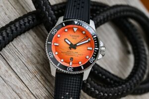 Tissot Gives the Seastar 2000 Professional a More Wearable 44mm Case Tissot Seastar 2000 Professional 44mm dive watches in blue orange and grey dial variations