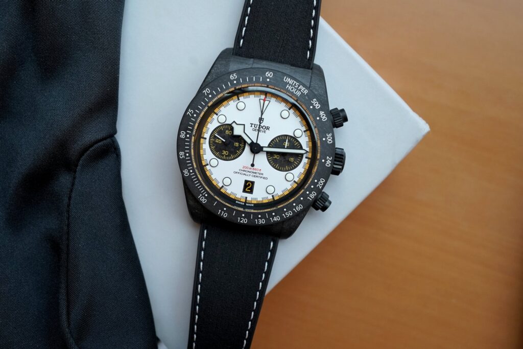 Tudor Black Bay Chrono Carbon 26 Brings Racing Bulls Colours Back to the Grid Tudor Black Bay Chrono Carbon 26 with racing white dial and yellow accents