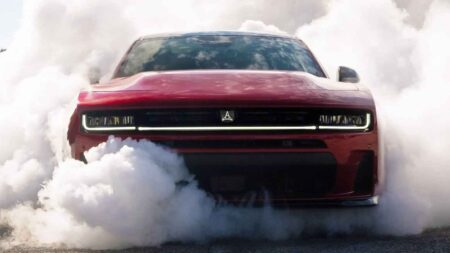 Dodge Charger SRT Hellcat concept-style muscle car on a drag strip at night