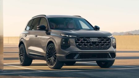 2027 Audi SQ7 front three-quarter view showing its redesigned grille and sporty black detailing