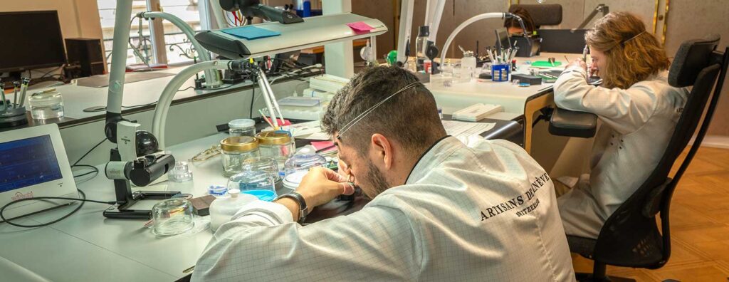 Artisans de Genève watchmakers working inside a Geneva customization atelier