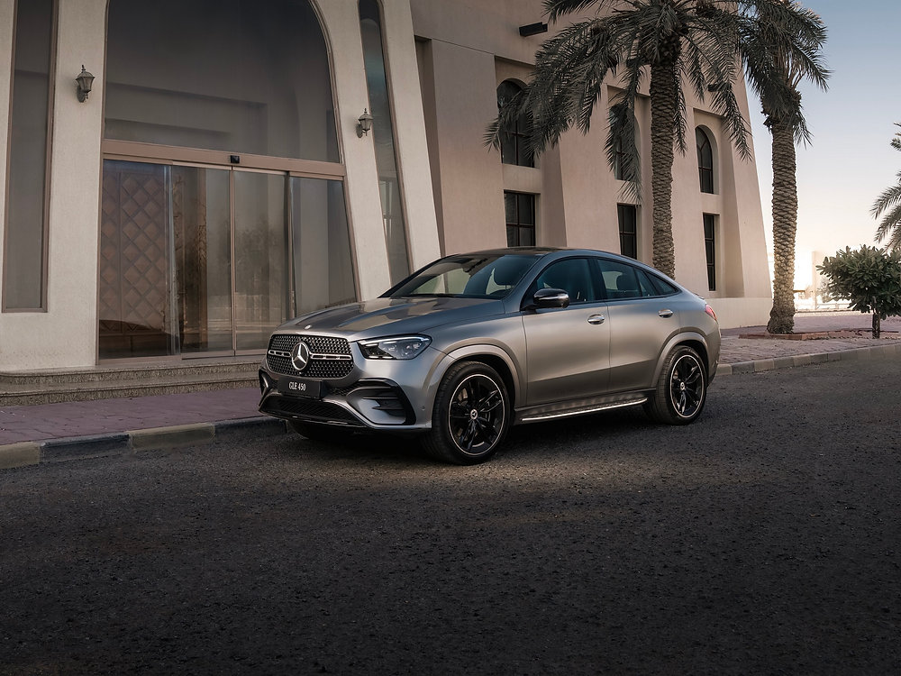 Mercedes-Benz models displayed at a Qatar showroom for the 140th anniversary ownership campaign