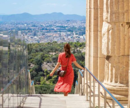 Why Athens Is a City Made for a Good Luxury Concierge View over Athens at golden hour with the Acropolis and city rooftops