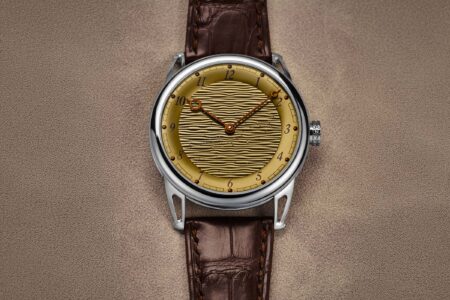 De Bethune DB25xs Sand Winds Turns Titanium Into a Desert Landscape De Bethune DB25xs Sand Winds with yellow heat-treated titanium guilloché dial