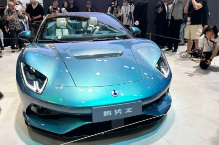 Denza Z electric roadster imagined on a European mountain road