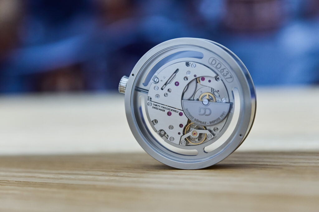 Precision watch movement components and microtechnology tools at a Geneva trade fair