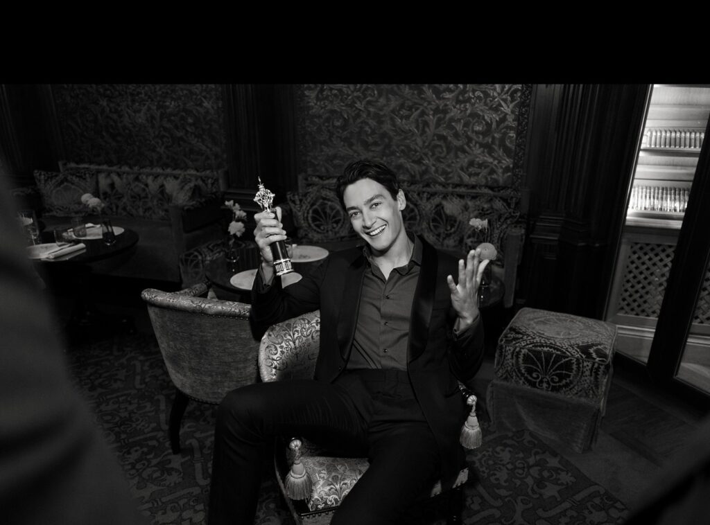 George Russell in an elegant AMAFFI fragrance campaign setting