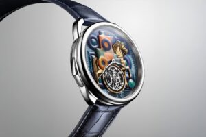 Hermès Gives the Arceau a Chiming Silk Scarf Dial Hermès Arceau Cavalier en Formes watch with colourful handcrafted dial and blue alligator strap