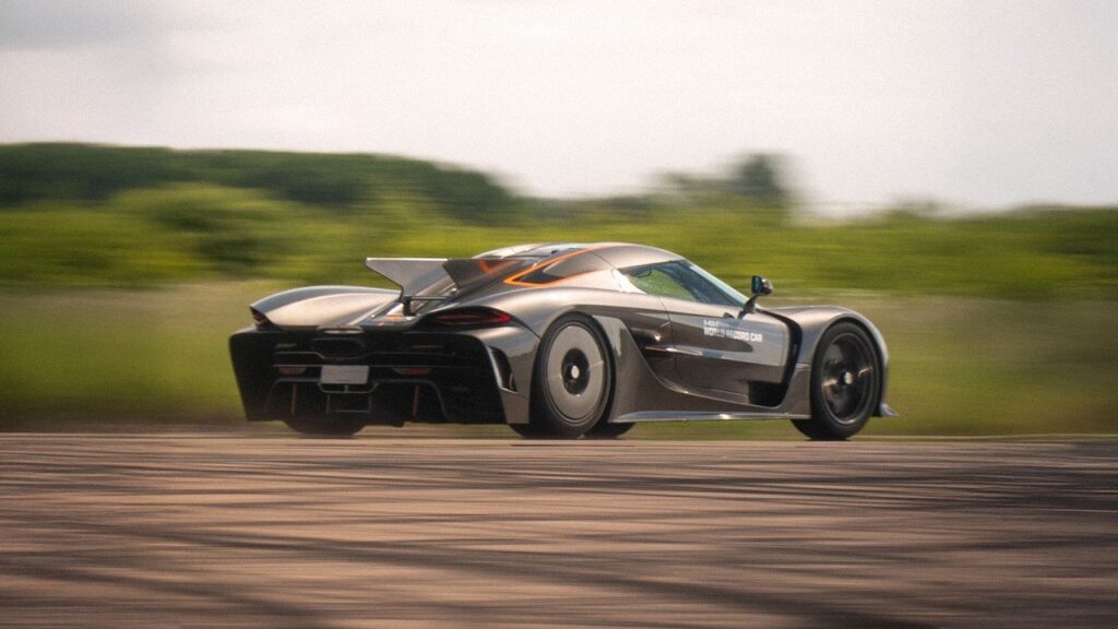 Koenigsegg Jesko Absolut Sets New Quarter-Mile and Half-Mile World Records Koenigsegg Jesko Absolut accelerating on a runway in Sweden