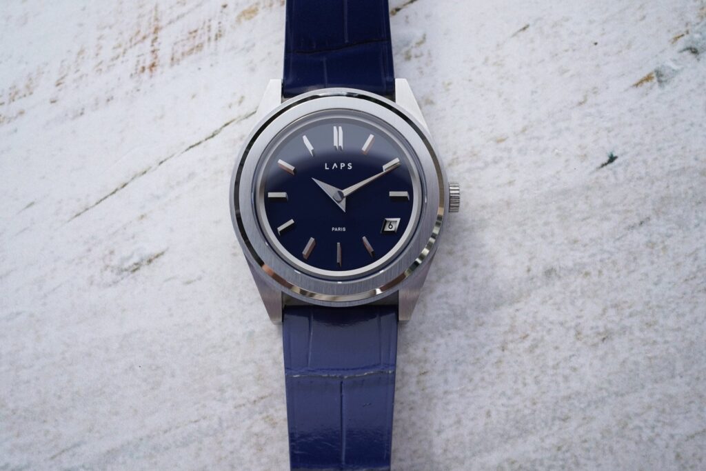 Laps Studio Arche automatic watch with architectural stainless steel case and faceted dial details